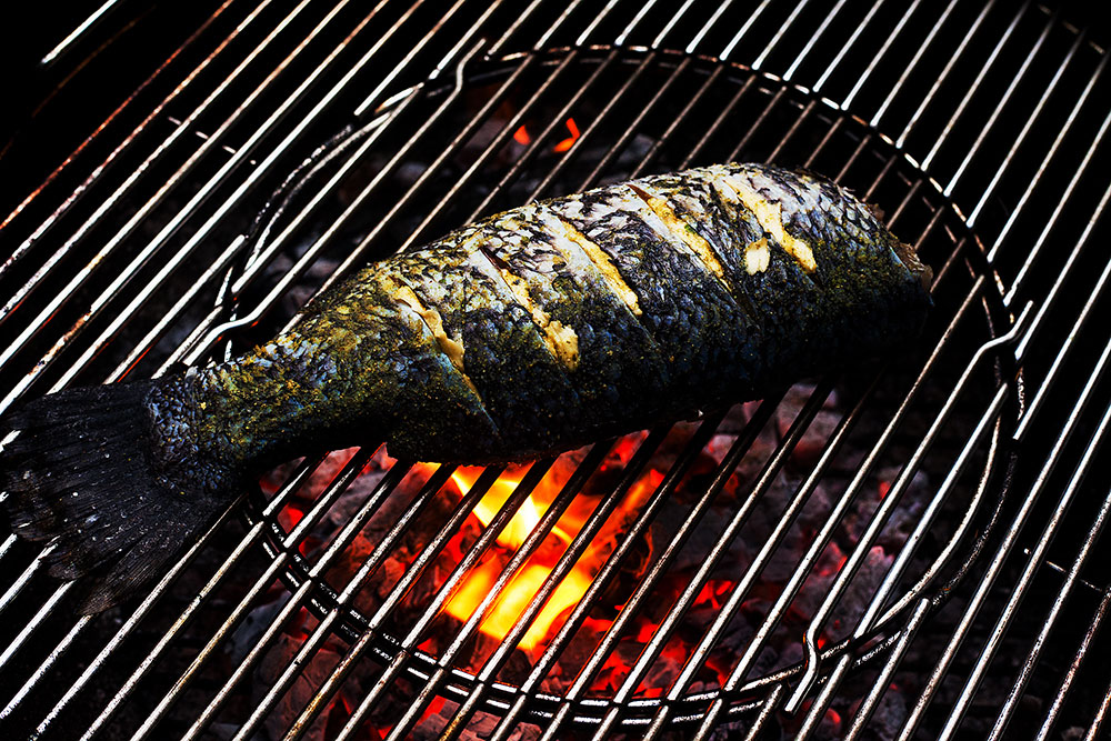 Fire cooked fish has a smoky taste that pairs well with salt in your fish.